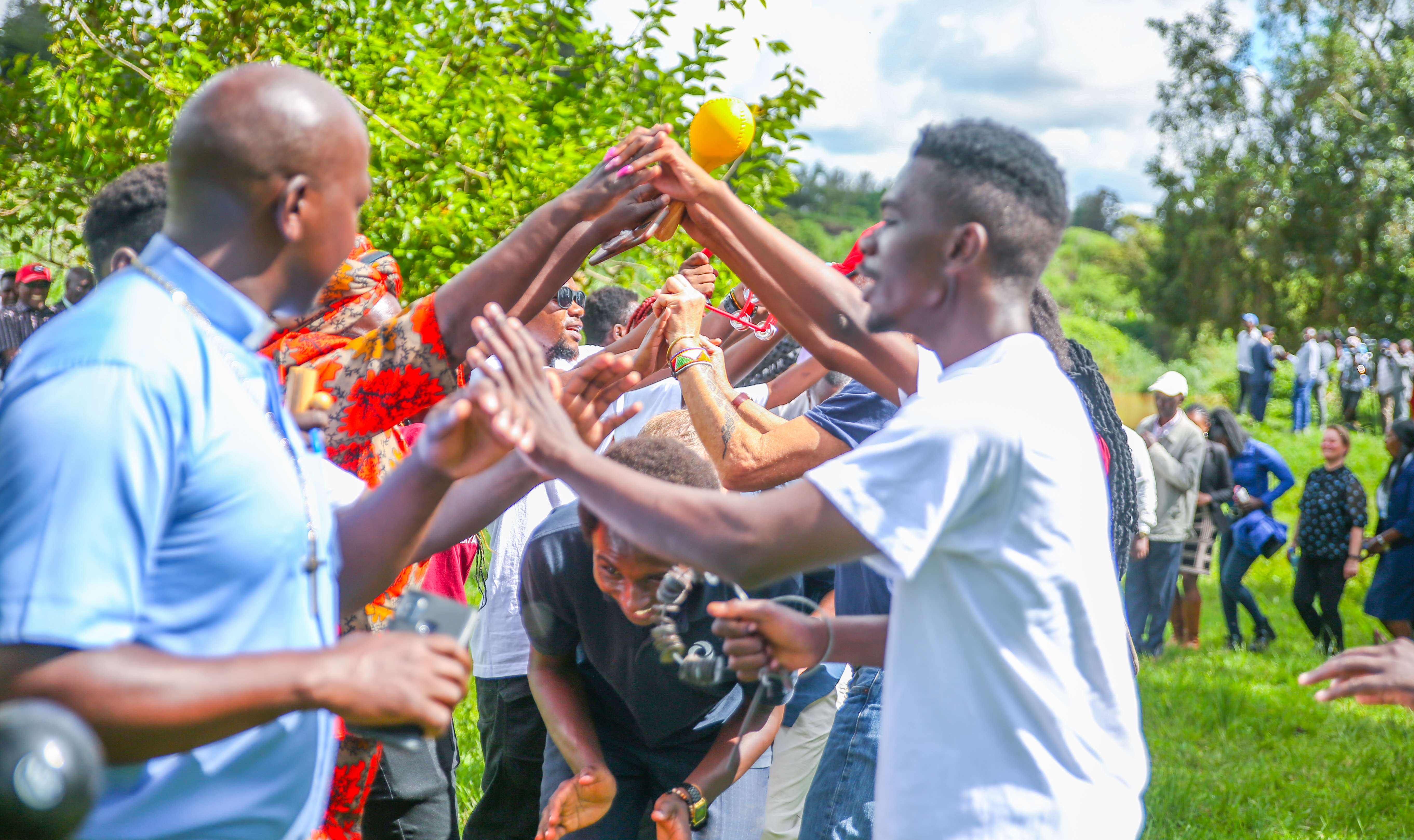 Participants dancing a njururi song next to the river.jpg